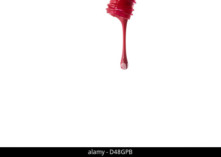 Spilled red nail polish Stock Photo