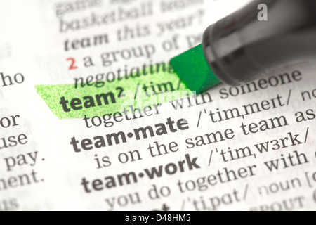 Team definition highlighted in green Stock Photo