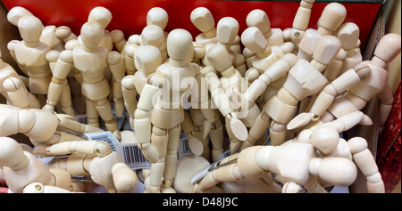 A box of miniature artist's mannequins for drawing figure studies Stock Photo