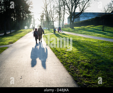 Parents and children walking to primary school on a winter morning, Aberystwyth Wales UK Stock Photo