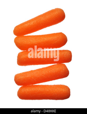 Five baby carrots isolated on white background Stock Photo