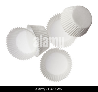 Paper muffin cups isolated on white background Stock Photo