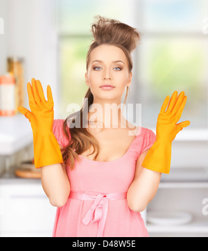 housewife with protective gloves Stock Photo