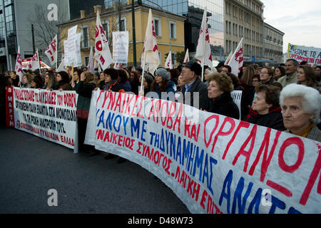 Athens, Greece, 8th March 2013. International women's day is celebrated in Athens with a demonstration against women's working rights abuse. Members and supporters of the Greek Communist Party held banners and shouted slogans against capitalism and government's policies. Credit:  Nikolas Georgiou / Alamy Live News Stock Photo