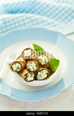 Healthy eggplant rolls stuffed with cheese Stock Photo