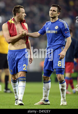07.03.2013 Bucharest Romania..FC Steaua Bucuresti versus Chelsea Europa League Football knock-out stages 1/8 finals. John Terry with Frank Lampard Chelsea shake hands after losing the match 1-0 Stock Photo