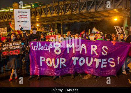 Paris, France.   French Feminists Groups Marching in International  Woman's Day Demonstration. March 8, Crowd Holding Protest Signs, Banner, equality women's rights day, female empowerment signs Stock Photo