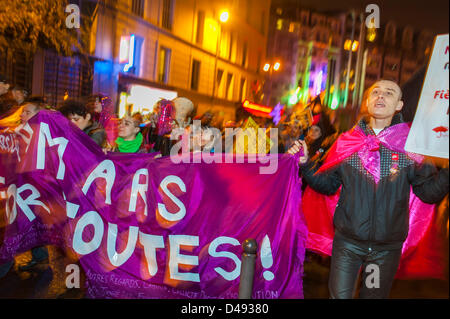 Paris, France.   French Feminists Groups Marching in Annual  Woman's Day Demonstration. Crowd with Protest Banners on Street, human rights activists Stock Photo