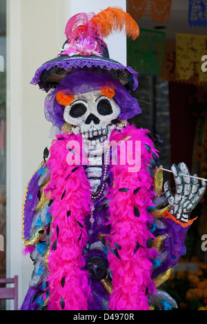 Dressed-up skeleton on display in courtyard for Day of the Dead festival, Oaxaca, Mexico. Stock Photo