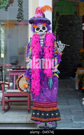 Dressed-up skeleton on display in courtyard for Day of the Dead festival, Oaxaca, Mexico. Stock Photo