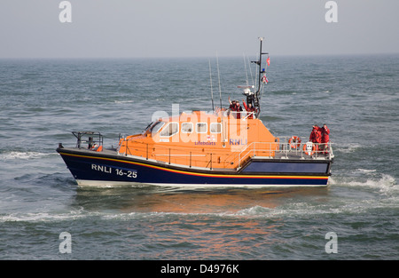 Moelfre Isle of Anglesey North Wales New Tamar Class £2.7million RNLI lifeboat RNLB Kiwi in Irish Sea working from a busy lifeboat station Stock Photo