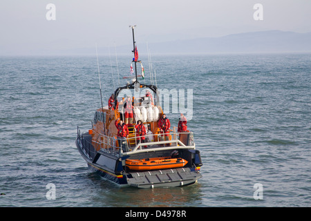 Moelfre Isle of Anglesey North Wales Tamar Class £2.7million RNLI lifeboat RNLB Kiwi transom door down showing powered Y boat busy lifeboat station Stock Photo