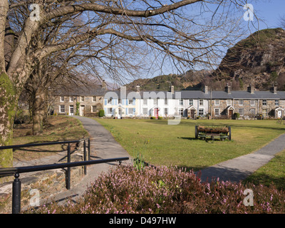 Traditional Welsh cottages overlooking green in picturesque Beddgelert village in Snowdonia National Park Gwynedd North Wales UK Stock Photo