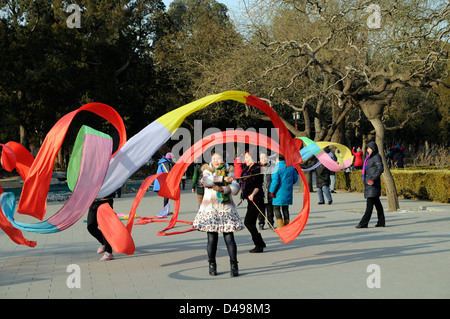 Locals practicing traditional ribbon dancing in Beijing Stock Photo