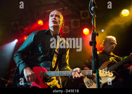 Bilston, Wolverhampton, UK. 7th March 2013. Singer, guitarist and ex-Dr Feelgood member Wilko Johnson and his band, on his Farewell Tour, at the Robin2in Bilston. Bass player Norman Watt-Roy is to the right. Credit:  John Bentley / Alamy Live News Stock Photo