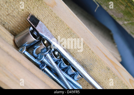 Screwdriver on Bolts. Stock Photo