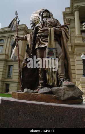 Grey sky portrait bronze statue Chief  Washakie standing named plinth, front State Capitol Building, Cheyenne, Wyoming, USA Stock Photo