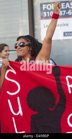 Los Angeles, USA. 9th March, 2013. A woman protests during a march and rally ''calling on women to take to the streets to stop violence against women everywhere.'' as they march to commemorate the International Women's Day in Los Angeles, Saturday, March 9, 2013. (Credit Image: Credit:  Ringo Chiu/ZUMAPRESS.com/Alamy Live News) Stock Photo