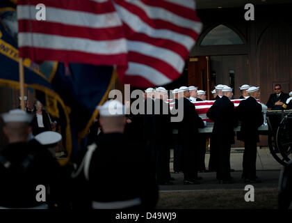 Members of the US Navy Ceremonial Guard escort the caskets during the funeral with full military honors for two Sailors recovered from the ironclad USS Monitor at Arlington National Cemetery  March 8, 2013 in Arlington, VA. The Monitor sank off Cape Hatteras, NC during the Civil War in 1862. Stock Photo
