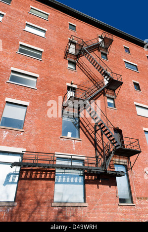 Fire escape stairs on the exterior of an apartment building in Montreal, province of Quebec, Canada. Stock Photo