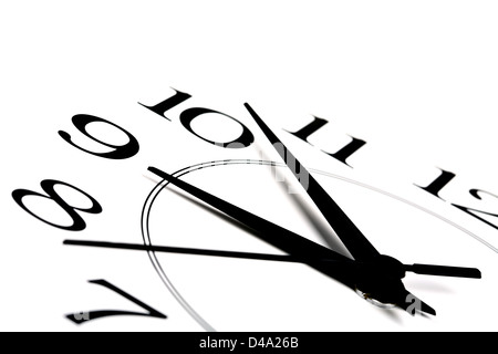 white clock showing time about nine isolated Stock Photo