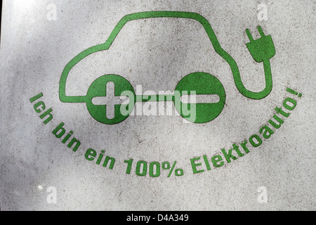 'I am an 100% electric car' slogan on a Siemens movE electric car (Suzuki Splash platform). Stock Photo
