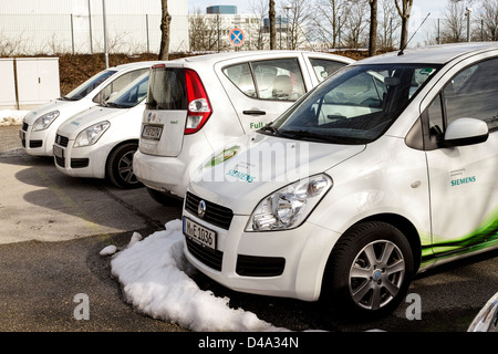 Siemens movE electric car (Suzuki Splash platform) being recharged at a Siemens charging station in Munich Stock Photo
