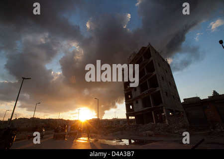 Smoke rises from an attack on Salheddine section of Aleppo, Syria on Fri. March 1, 2013. Stock Photo