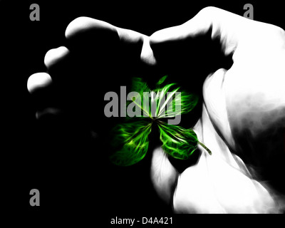 Illustration of a male hand offering a four-leaf clover Stock Photo