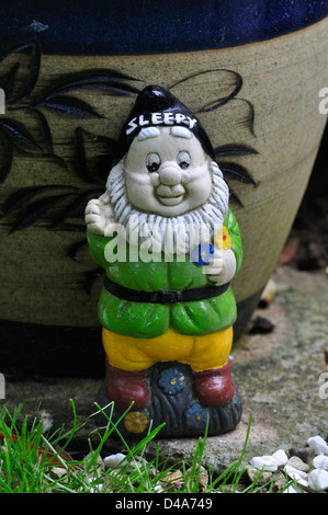 One of the dwarves in the fairy tale doubling up as a garden gnome Stock Photo