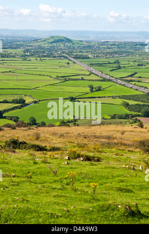View from Crook Peak to Brent Knoll, the Somerset Levels, M5 motorway, Hinkley Point, Bristol Channel, South West England Stock Photo