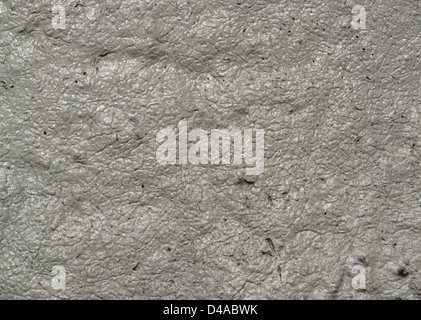 full frame wet grey muddy background Stock Photo