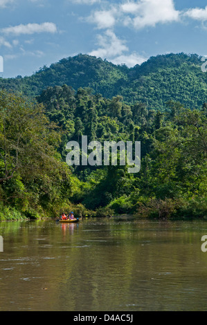 kayaking the Nam Ha River in Nam Ha Protected Area, Luang Nam Tha, Laos Stock Photo