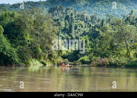 kayaking the Nam Ha River in Nam Ha Protected Area, Luang Nam Tha, Laos Stock Photo