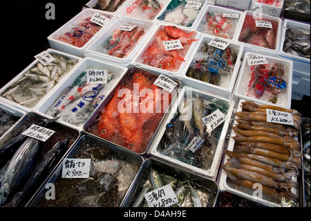 A variety of fresh fish for sale in the retail section at Tsukiji Wholesale Fish Market, world's largest fish market in Tokyo Stock Photo