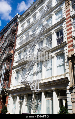 Fire escape ladders on the building in Manhattan Stock Photo