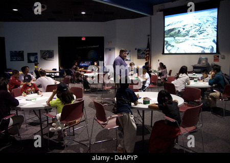 Visitors at Goddard Sunday Experiment engage in interactive space activities, experiments, and demonstrations to learn about space exploration, scientific research, technology, and NASA missions through hands-on educational experiences. Stock Photo