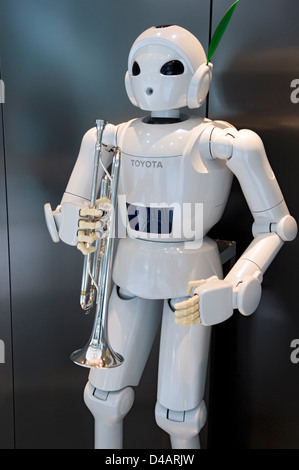 A white, humanoid, trumpet-playing 'Toyota Partner Robot' on display at the Toyota Kaikan Visitor's Center in Toyota City, Japan Stock Photo