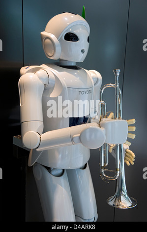 A white, humanoid, trumpet-playing 'Toyota Partner Robot' on display at the Toyota Kaikan Visitor's Center in Toyota City, Japan Stock Photo