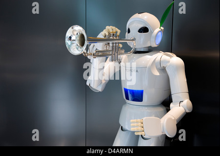 A white, humanoid, trumpet-playing 'Toyota Partner Robot' on display at the Toyota Kaikan Visitor's Center in Toyota City, Japan Stock Photo