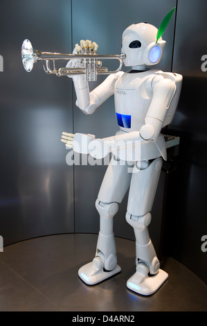 A white, humanoid, trumpet-playing 'Toyota Partner Robot' on display at the Toyota Kaikan Visitor's Center in Toyota City, Japan Stock Photo