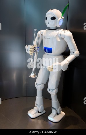 A white, humanoid, trumpet-playing 'Toyota Partner Robot' on display at the Toyota Kaikan Visitor's Center in Toyota City, Japan Stock Photo