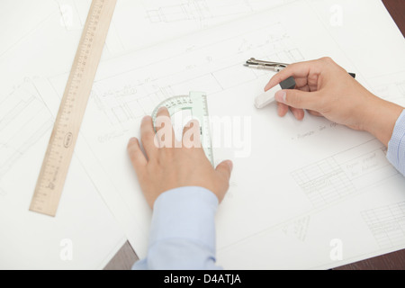 Hands male architect to make drawings using various line pencil and compass Stock Photo