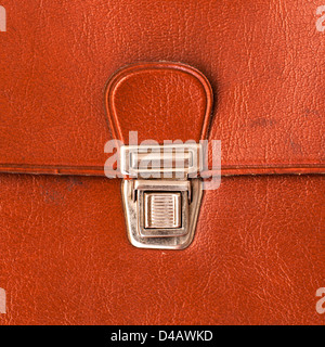 metal lock old red leather briefcase Stock Photo