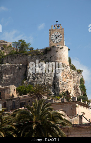 Modica, Italy, overlooking the castle ruins with the conspicuous large clock tower Stock Photo