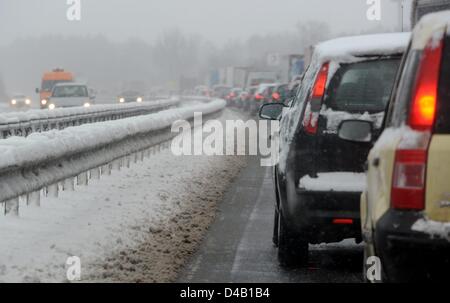 Cars are stuck in a traffic jam at the A7 motorway near Bad Bramstedt, Germany, 11 March 2013. Winter weather obstructs traffic in the north of Germany. Photo: Carsten Rehder Stock Photo
