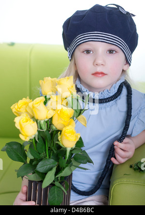 Beautiful girl with yellow flowers bouquet Stock Photo