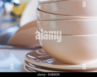 Clean dishes in kitchen sink. Stock Photo
