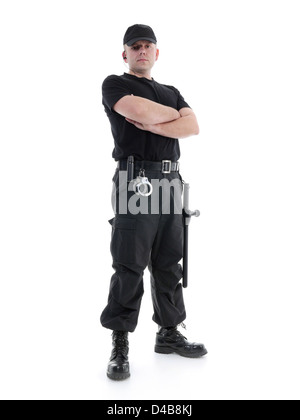Security man wearing black uniform equipped with police club and handcuffs standing confidently with arms crossed, shot on white Stock Photo