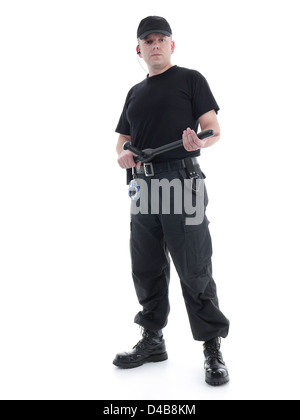 Security man wearing black uniform holding police club in both hands standing confidently,shot on white Stock Photo